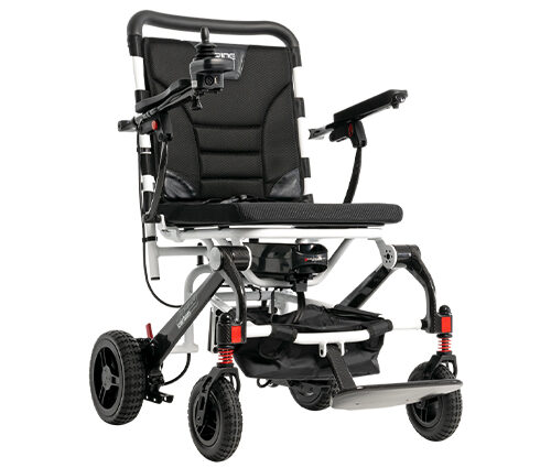 Pride Mobility Jazzy Carbon portable travel power wheelchair with black seat and wheels. 