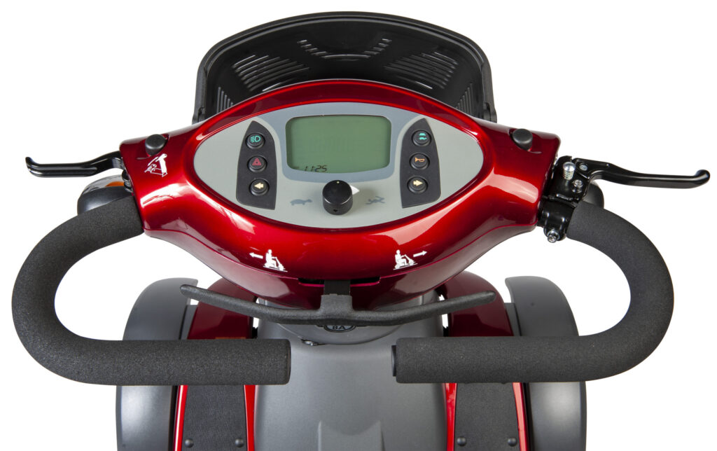 The dashboard on a red Trailmaster Yeti S746 mobility scooter.