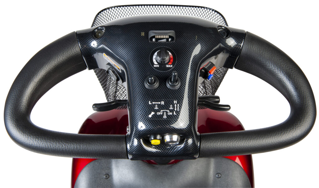 A view of the dashboard on a red Shoprider TrailBlazer 889SL/SE mobility scooter. 