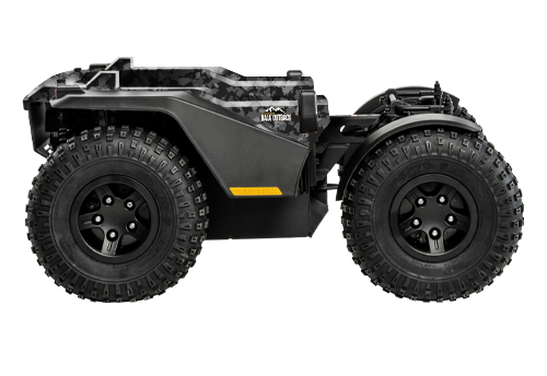 A side view of the base of a camo Quantum Outback power wheelchair.