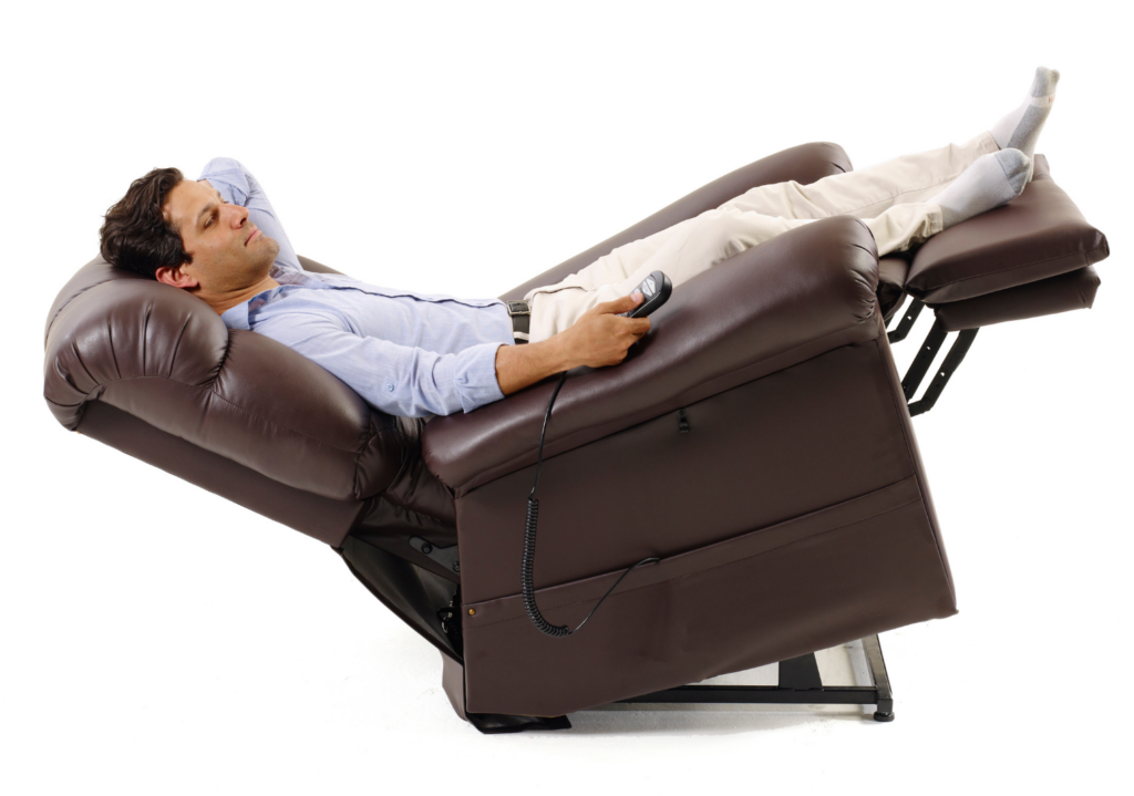 A man lounging on a EZ Sleeper with Twilight power lift recliner from Golden Technologies